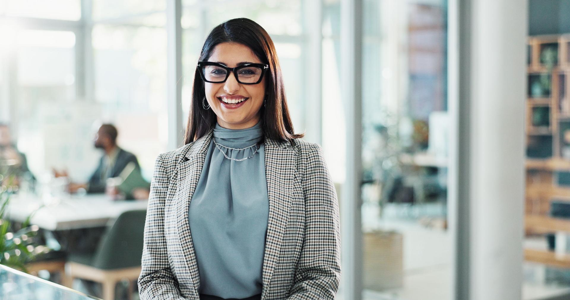 Portrait, hr manager and woman in office with smile, professional career and pride. Face, about us and happy person with ambition, business experience or recruitment for corporate growth